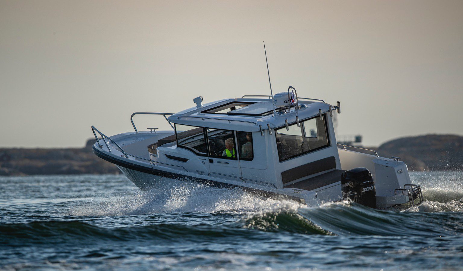 Nimbus boat turning right and driving fast in cloudy weather