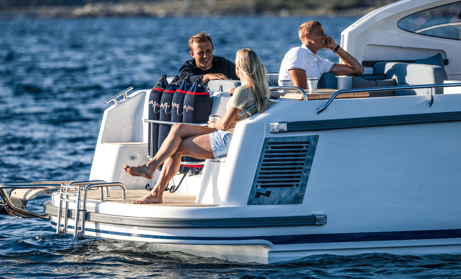 People enjoying the sun on a Nimbus boat