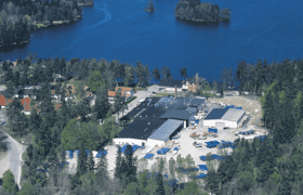 buildings from above next to an ocean