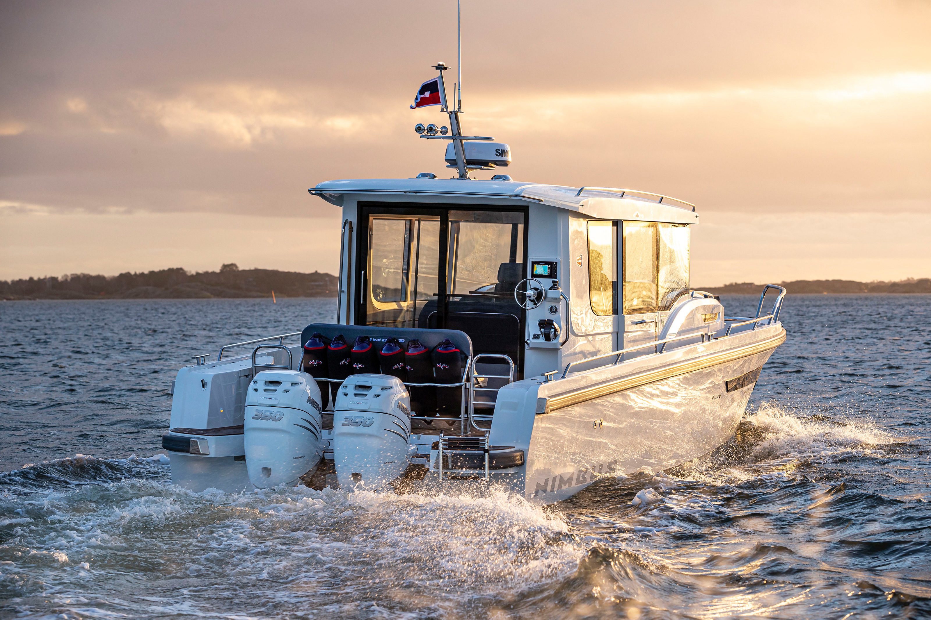 The back of a Nimbus C11 boat on the ocean