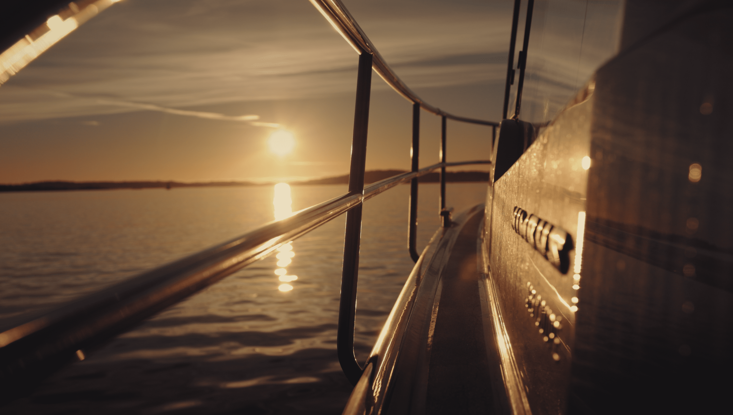 Boat in the sunset laying still on the water